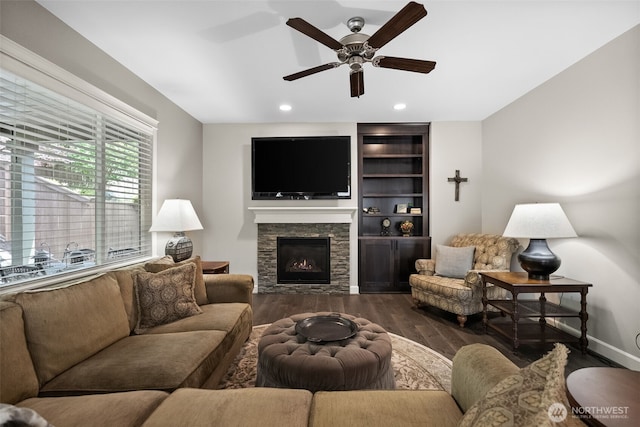 22412 SE 283rd St, Maple Valley, WA 98038 - living room featuring a ceiling fan, dark wood-style floors, a fireplace, and recessed lighting