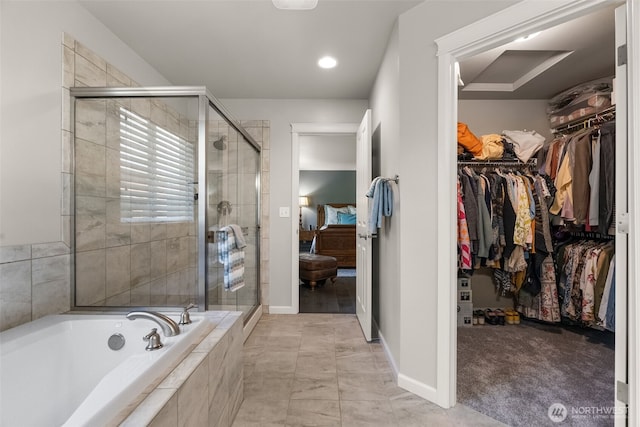 22412 SE 283rd St, Maple Valley, WA 98038 - ensuite bathroom featuring a garden tub, a stall shower, and a walk in closet