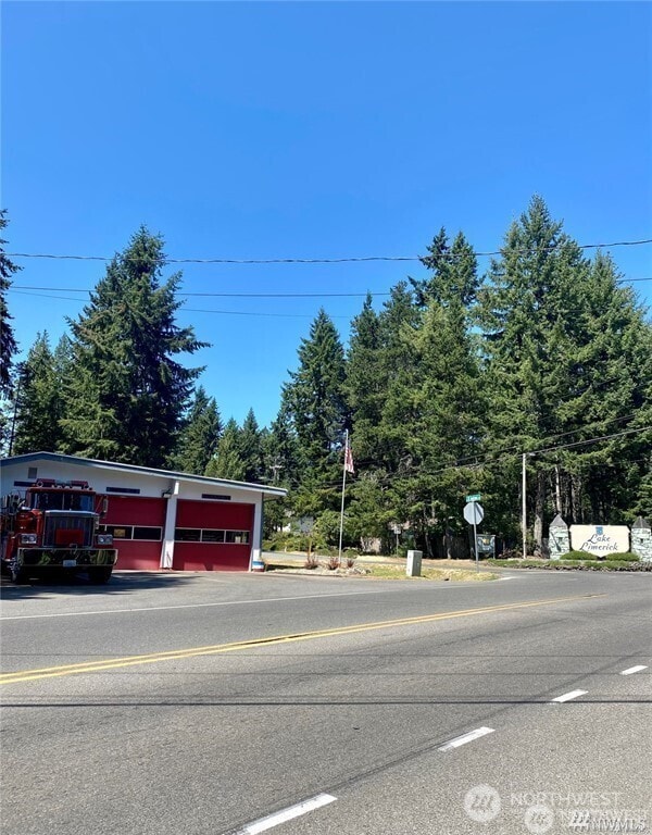 550 E Way To Tipperary, Shelton, WA 98584 - view of asphalt road featuring traffic signs