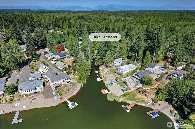 550 E Way To Tipperary, Shelton, WA 98584 - aerial overview of property's location featuring a heavily wooded area, a water and mountain view, and nearby suburban area