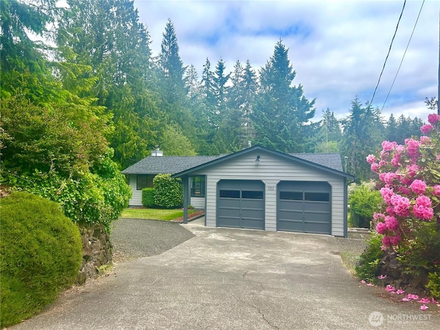 550 E Way To Tipperary, Shelton, WA 98584 - ranch-style home featuring asphalt driveway, an attached garage, and a shingled roof