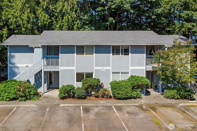 9106 1st Pl NE Unit 1, Lake Stevens, WA 98258 - view of property featuring uncovered parking and stairs