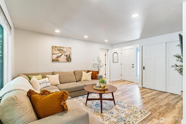 9106 1st Pl NE Unit 1, Lake Stevens, WA 98258 - living area featuring light wood-type flooring and recessed lighting