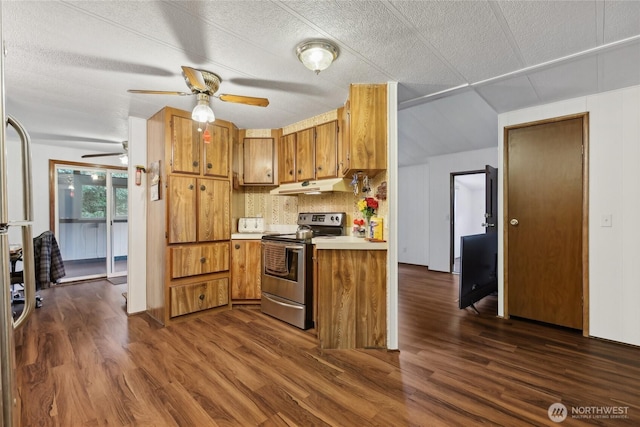 35605 158th St SE, Sultan, WA 98294 - kitchen with stainless steel electric stove, under cabinet range hood, brown cabinetry, a ceiling fan, and dark wood finished floors