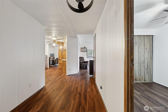 35605 158th St SE, Sultan, WA 98294 - hall featuring dark wood-style flooring and wooden walls