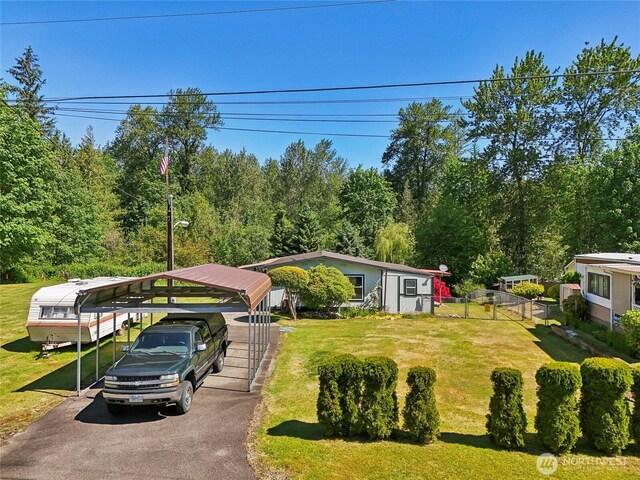 35605 158th St SE, Sultan, WA 98294 - manufactured / mobile home with a carport and asphalt driveway