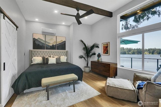 4902 Weber Rd, Snohomish, WA 98290 - bedroom with a wall unit AC, wood finished floors, ceiling fan, and recessed lighting
