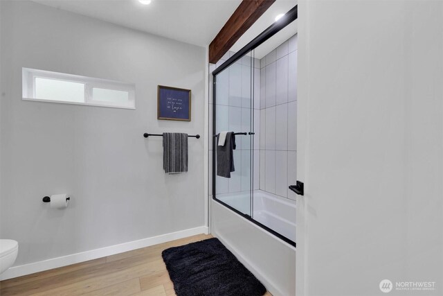 4902 Weber Rd, Snohomish, WA 98290 - full bath featuring toilet, baseboards, wood finished floors, shower / bath combination with glass door, and beamed ceiling