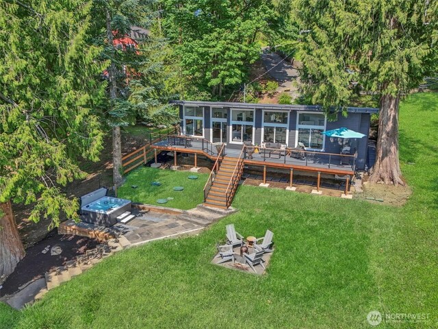 4902 Weber Rd, Snohomish, WA 98290 - rear view of house featuring a fire pit, a wooden deck, and stairs