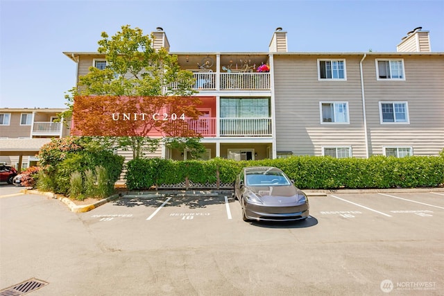 1132 N 198th St Unit C204, Shoreline, WA 98133 - view of property with uncovered parking