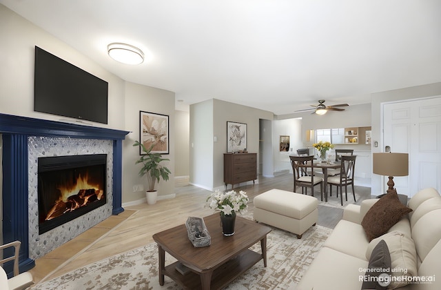 1132 N 198th St Unit C204, Shoreline, WA 98133 - living room with a ceiling fan, light wood finished floors, and a fireplace