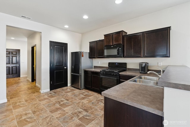 19218 18th Avenue Ct E, Spanaway, WA 98387 - kitchen featuring black appliances, dark brown cabinets, recessed lighting, and light stone finish flooring