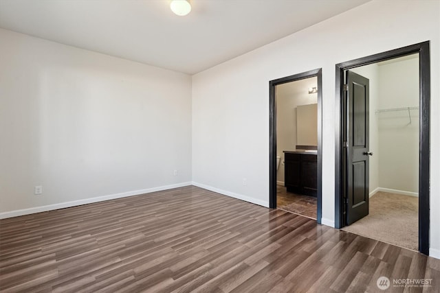 19218 18th Avenue Ct E, Spanaway, WA 98387 - spare room featuring dark wood-style floors and baseboards
