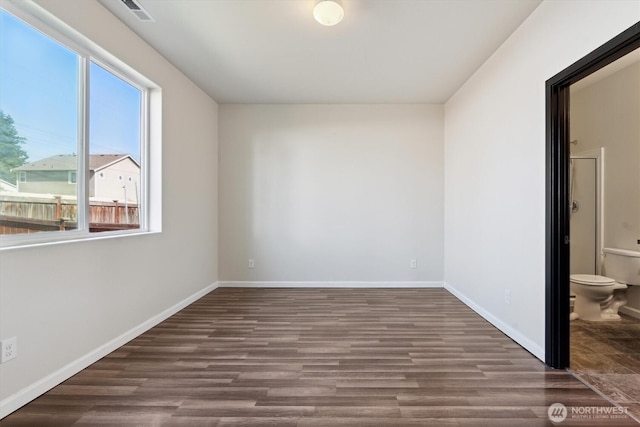 19218 18th Avenue Ct E, Spanaway, WA 98387 - unfurnished room featuring plenty of natural light and wood finished floors