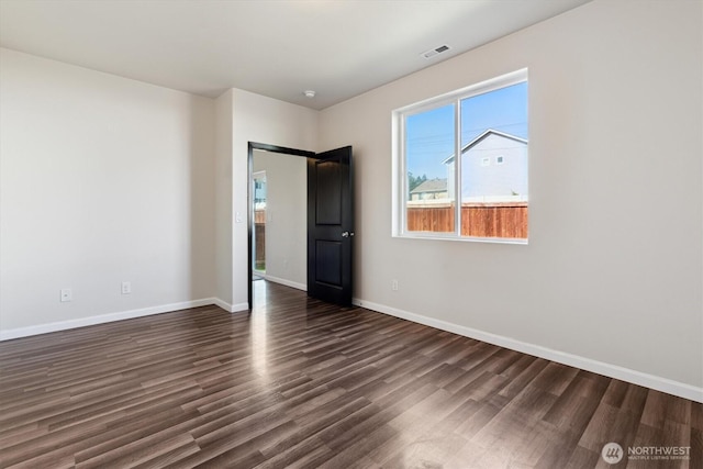 19218 18th Avenue Ct E, Spanaway, WA 98387 - unfurnished room featuring dark wood-style flooring