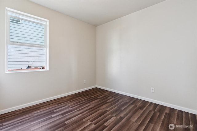 19218 18th Avenue Ct E, Spanaway, WA 98387 - unfurnished room with dark wood-type flooring and baseboards