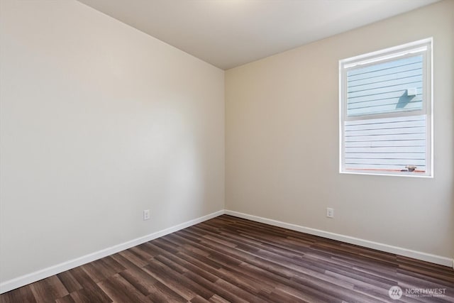 19218 18th Avenue Ct E, Spanaway, WA 98387 - empty room featuring dark wood-style flooring