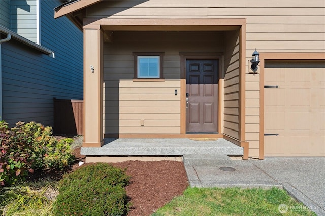 19218 18th Avenue Ct E, Spanaway, WA 98387 - doorway to property with an attached garage