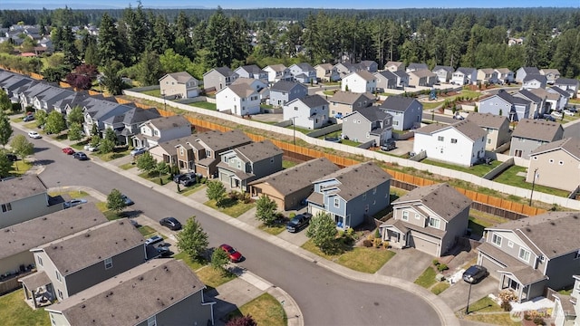 19218 18th Avenue Ct E, Spanaway, WA 98387 - aerial perspective of suburban area with a forest