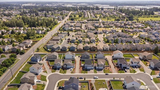 19218 18th Avenue Ct E, Spanaway, WA 98387 - aerial view of property and surrounding area with nearby suburban area