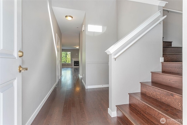 348 Grady Way, Bellingham, WA 98226 - staircase with wood finished floors, baseboards, and a wainscoted wall