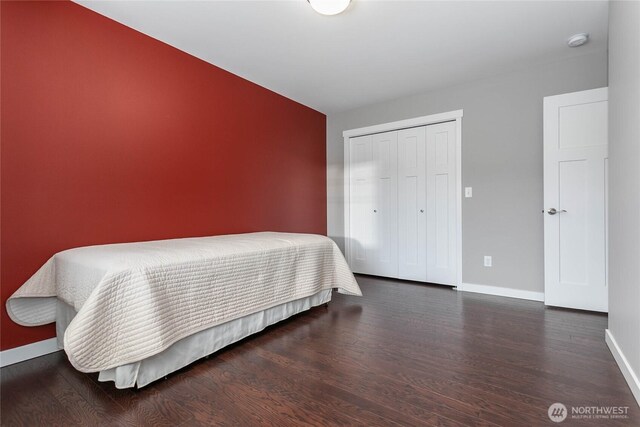 348 Grady Way, Bellingham, WA 98226 - bedroom featuring baseboards, wood finished floors, and a closet