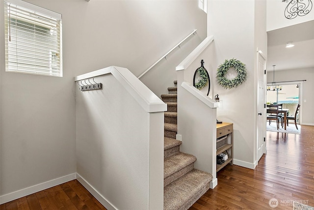 2237 55th St SE, Auburn, WA 98092 - stairway with hardwood / wood-style flooring and baseboards