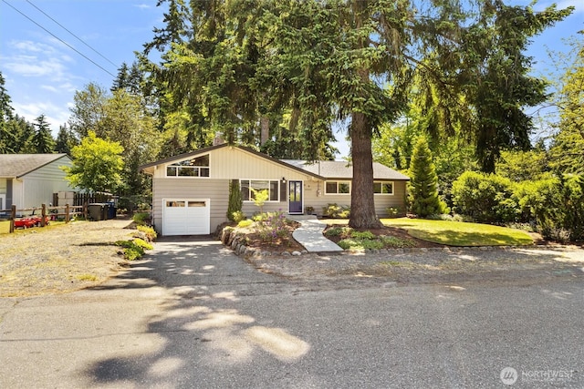 10502 240th Pl SW, Edmonds, WA 98020 - view of front of home with a garage and asphalt driveway