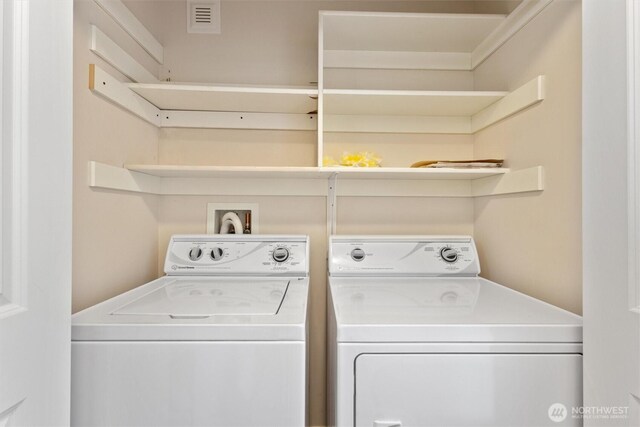 10502 240th Pl SW, Edmonds, WA 98020 - washroom featuring washer and clothes dryer