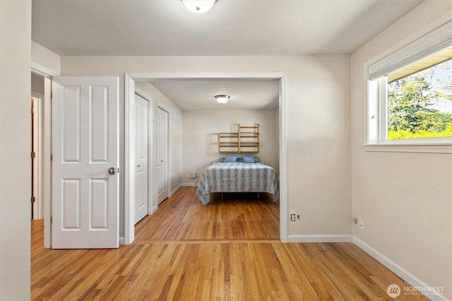 10502 240th Pl SW, Edmonds, WA 98020 - bedroom featuring light wood finished floors and baseboards