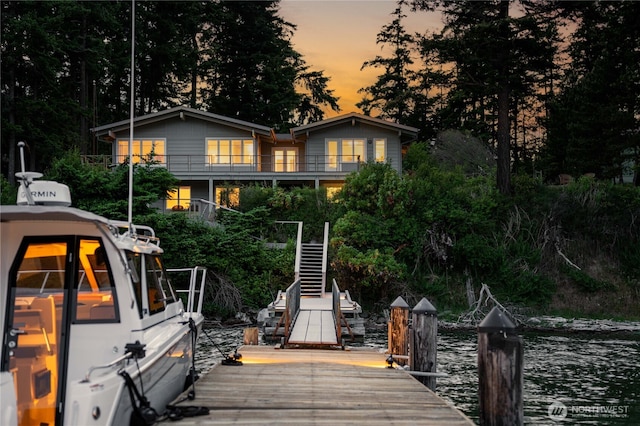 1794 Bayshore Rd, Lopez Island, WA 98261 - view of front of house with stairs, a dock, and a balcony