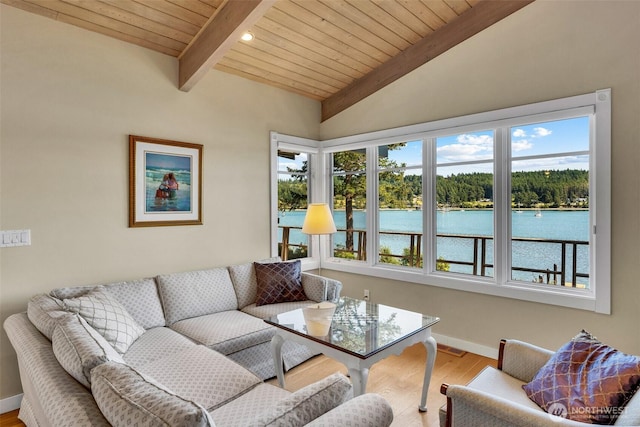 1794 Bayshore Rd, Lopez Island, WA 98261 - living room with wood ceiling, a water view, healthy amount of natural light, wood finished floors, and baseboards