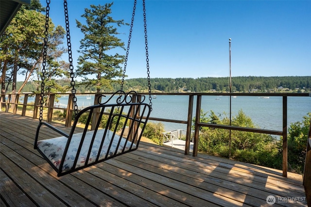 1794 Bayshore Rd, Lopez Island, WA 98261 - deck featuring a water view and a wooded view