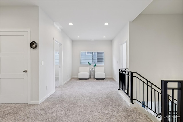 7724 16th Ave SW, Seattle, WA 98106 - living area with carpet floors, an upstairs landing, baseboards, and recessed lighting