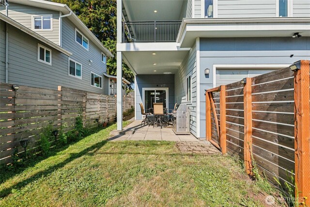 7724 16th Ave SW, Seattle, WA 98106 - property entrance with a balcony and a patio area