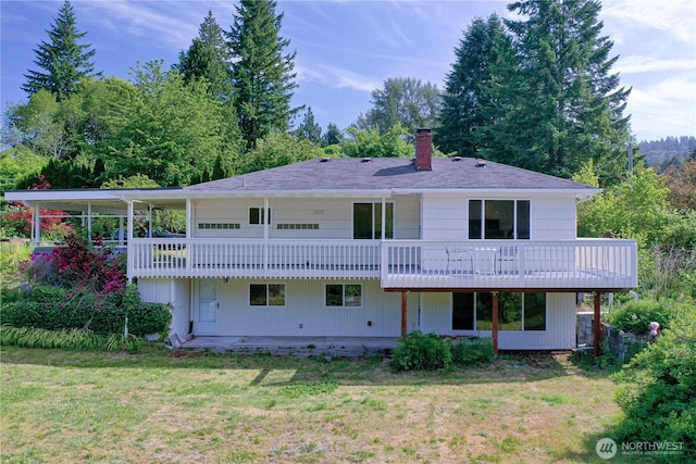 925 Front St S, Issaquah, WA 98027 - back of property with a chimney, a lawn, and a wooden deck