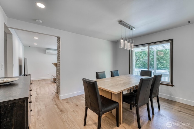 925 Front St S, Issaquah, WA 98027 - dining room with light wood-type flooring, a wall mounted air conditioner, and recessed lighting