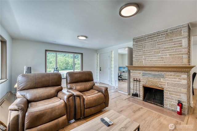 925 Front St S, Issaquah, WA 98027 - living room featuring light wood-style flooring and a fireplace