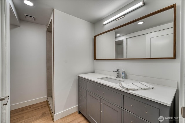 925 Front St S, Issaquah, WA 98027 - bathroom with vanity, wood finished floors, and recessed lighting