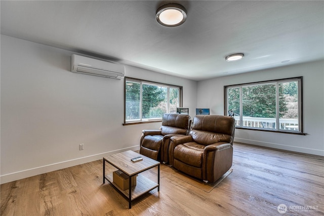 925 Front St S, Issaquah, WA 98027 - living area featuring an AC wall unit, healthy amount of natural light, and light wood-type flooring
