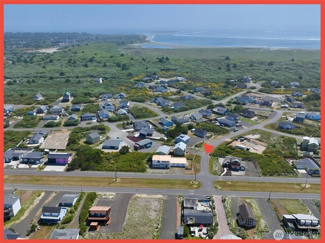 486 Winlock St, Ocean Shores, WA 98569 - aerial view of residential area featuring a nearby body of water