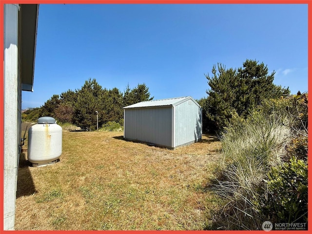 486 Winlock St, Ocean Shores, WA 98569 - view of grassy yard featuring a storage shed