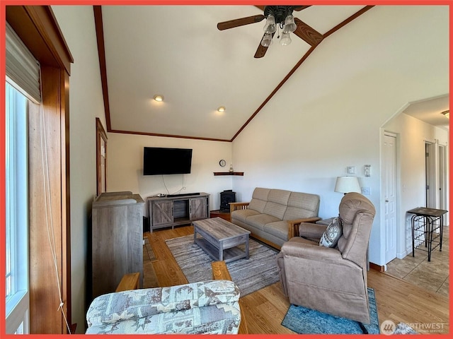 486 Winlock St, Ocean Shores, WA 98569 - living area with vaulted ceiling, ceiling fan, wood finished floors, and crown molding
