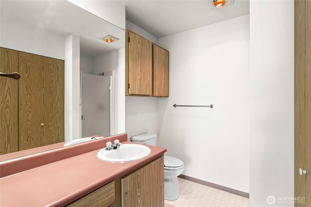 625 N Jackson Ave Unit A9, Tacoma, WA 98406 - full bath with toilet, tile patterned floors, vanity, a shower, and baseboards