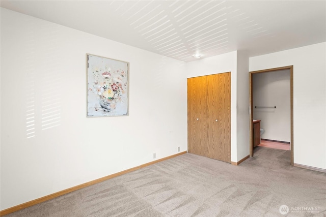625 N Jackson Ave Unit A9, Tacoma, WA 98406 - unfurnished bedroom with carpet flooring, baseboards, and a closet
