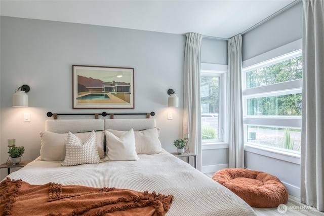 366 Lake View Loop NE, Ocean Shores, WA 98569 - bedroom featuring baseboards and wood finished floors
