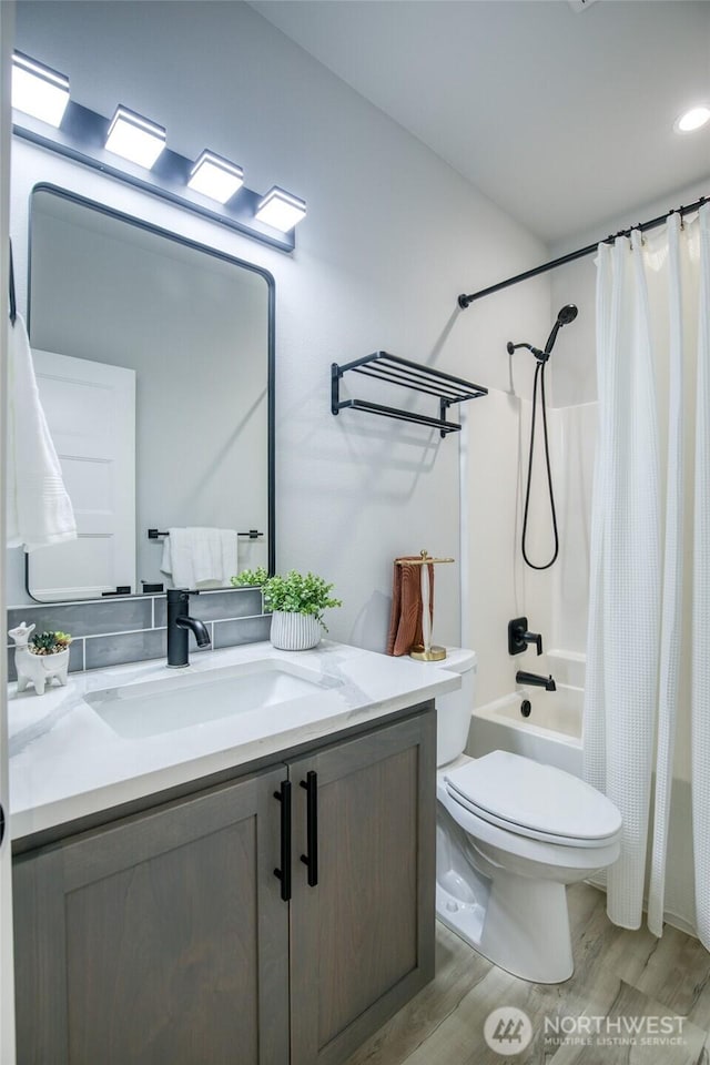 366 Lake View Loop NE, Ocean Shores, WA 98569 - full bathroom featuring vanity, wood finished floors, toilet, and shower / tub combo