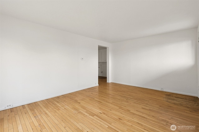 3586 E L St, Tacoma, WA 98404 - spare room with light wood-style flooring and baseboards