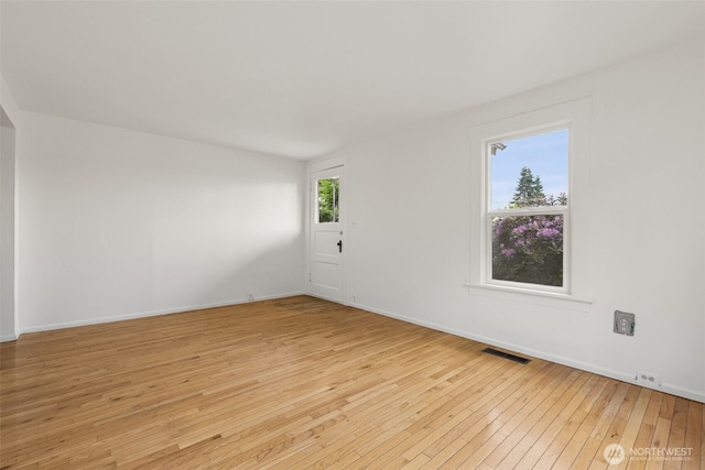 3586 E L St, Tacoma, WA 98404 - spare room featuring light wood-type flooring and baseboards