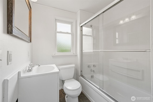 3586 E L St, Tacoma, WA 98404 - bathroom with vanity, toilet, and bath / shower combo with glass door